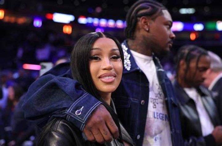 Cardi B Shows Off Her Huge Tattoos While Rocking A String Bikini Top In Hot New Video
