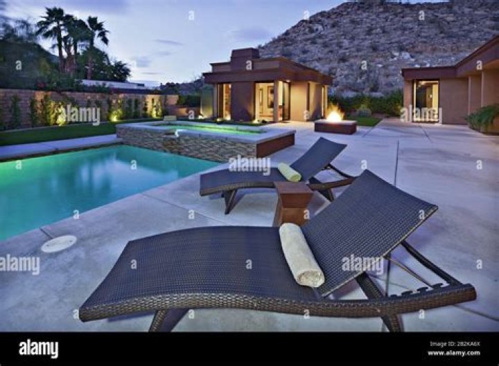 Kylie Jenner Lounges By the Pool in Black String Bikini: ‘Home Away From Home’