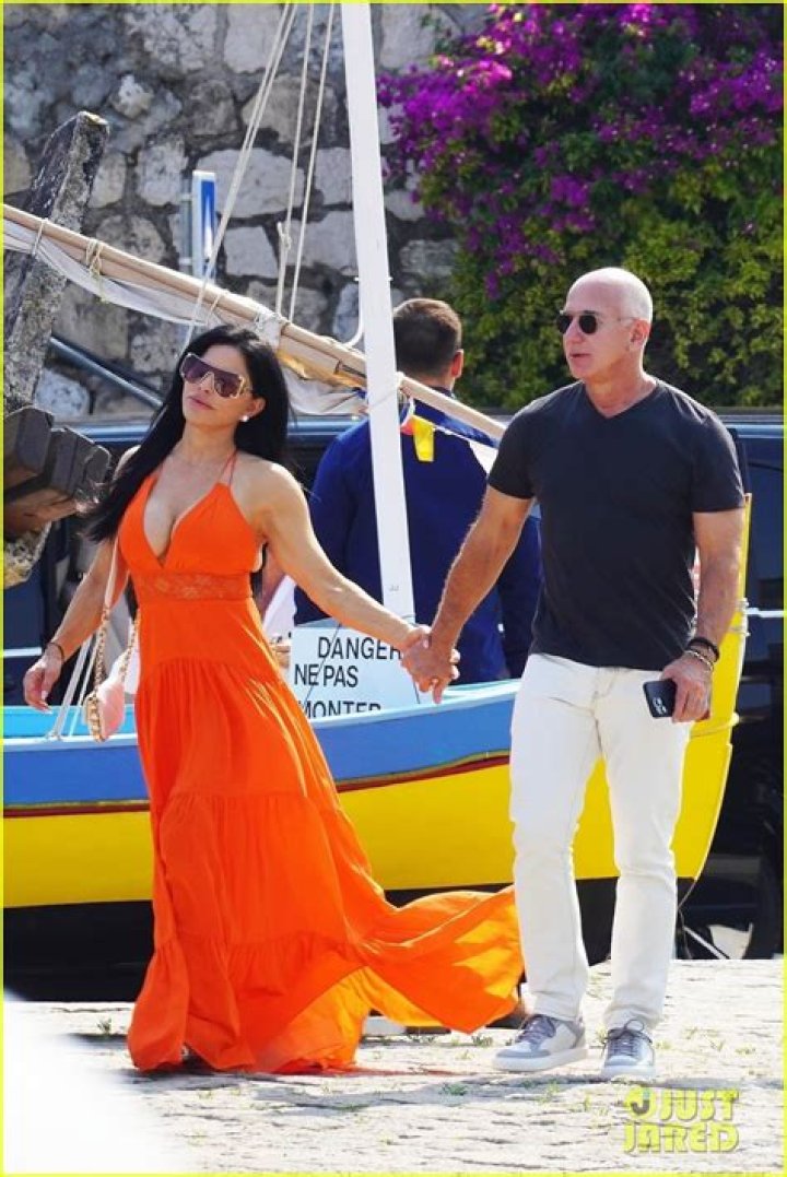 Lauren Sanchez Sizzles In Plunging Orange Dress Holding Hands With Fiance Jeff Bezos: Photos