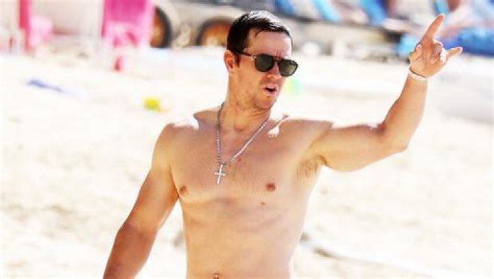 Mark Wahlberg Reveals Arm Muscles & Abs As He Hits The Gym To Lose 20 Lbs. He Gained For Movie