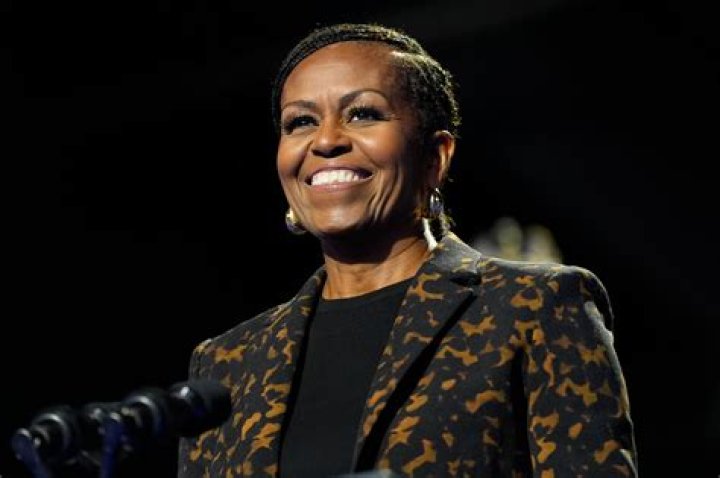 Michelle Obama Steps Out For Girls’ Night To Broadway Show In Gray & Black Outfits: Photos