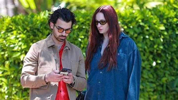 Pregnant Sophie Turner Covers Baby Bump In Oversized Shirt While Out With Joe Jonas