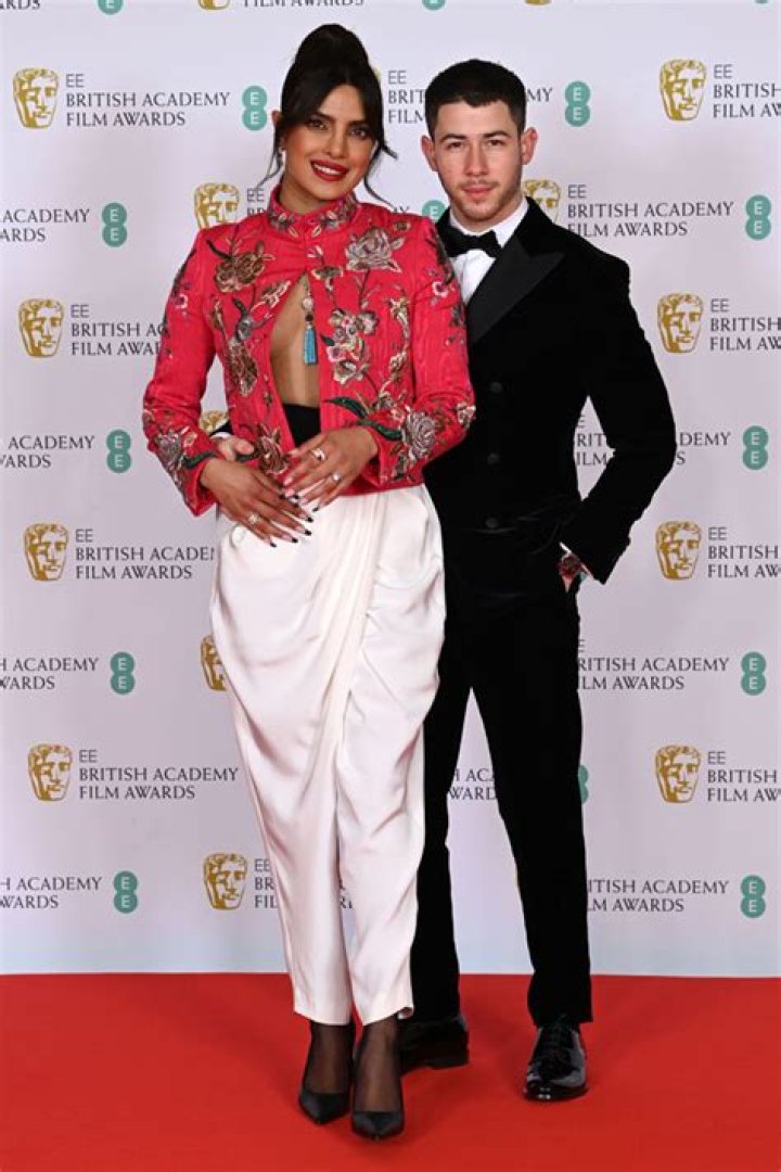Priyanka Chopra Wears Daring Front Slit Blouse & PDAs With Nick Jonas On The BAFTAs Red Carpet — Pics