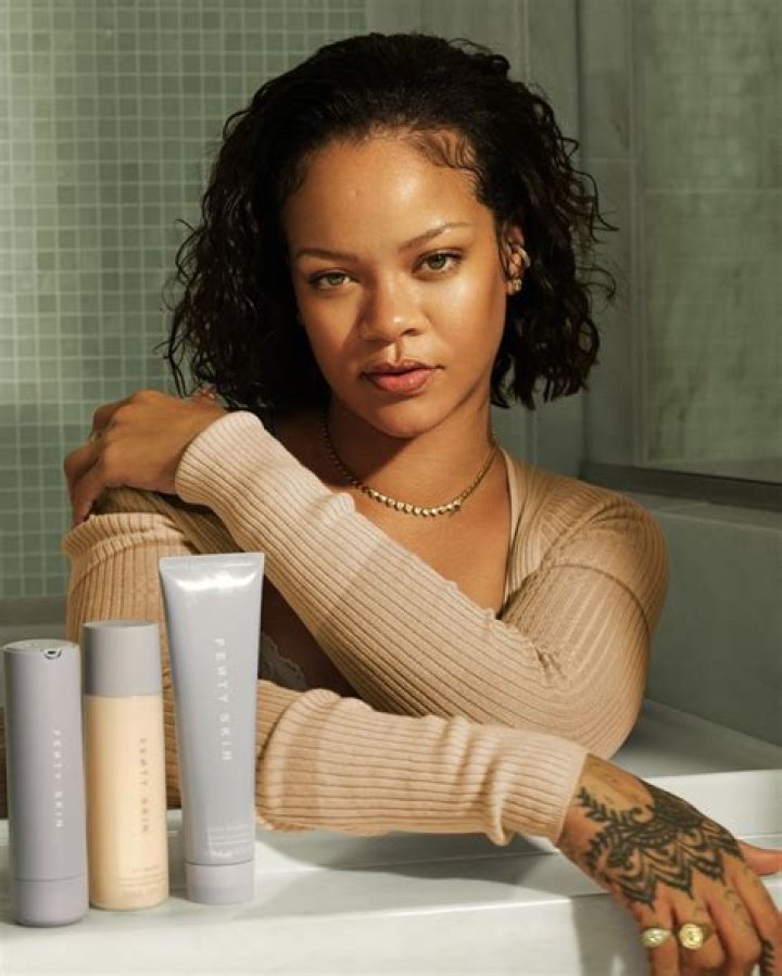 Rihanna Slays In Sexy Silver Dress For Hot New Fenty Beauty Pics